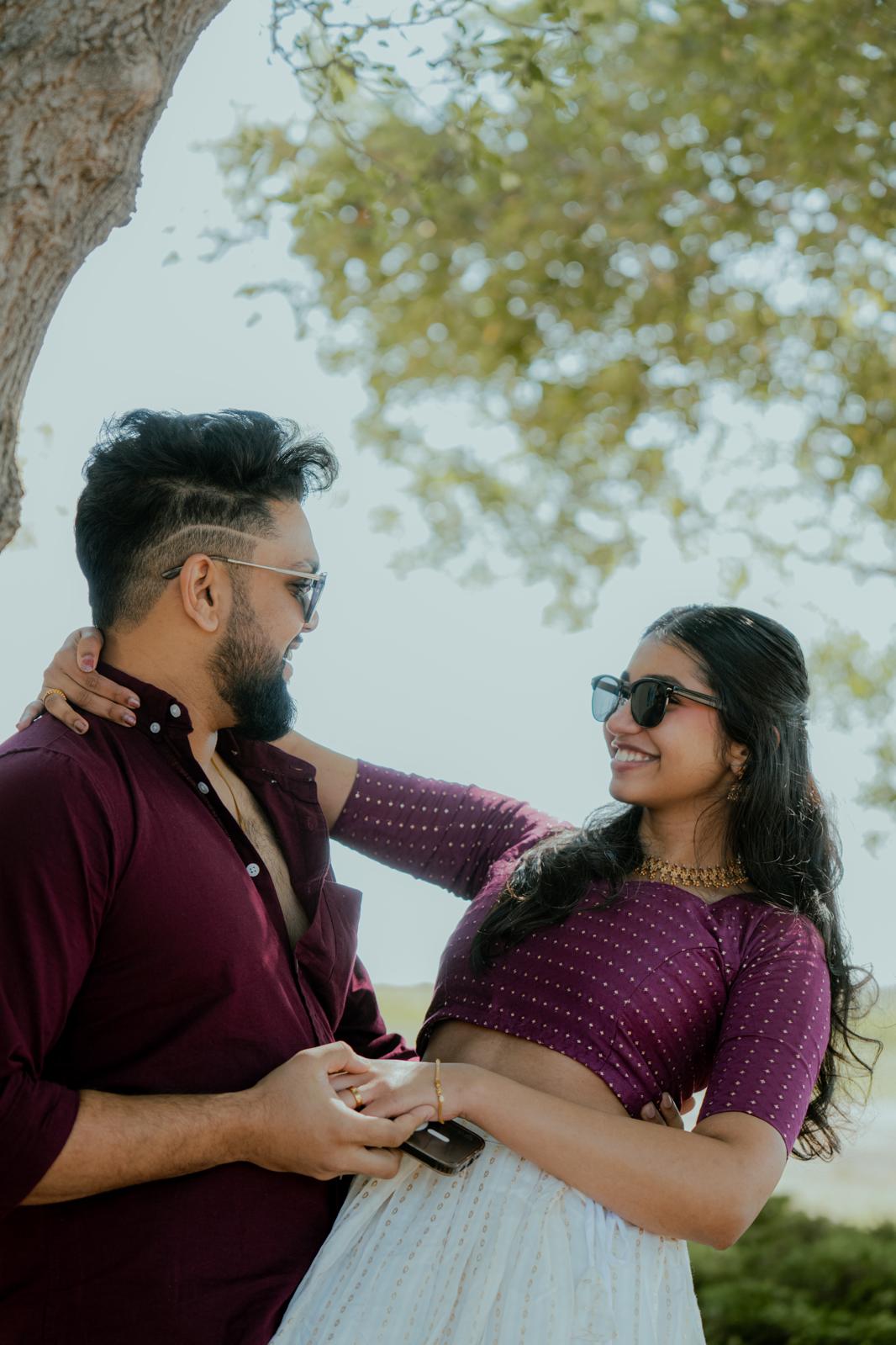 Steve and Anjana under a tree